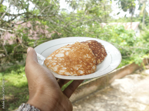 Serabi, a typical Indonesian pancake made from rice flour and coconut milk. Serabi is one of the roadside snacks and a favorite menu during the month of Ramadan photo