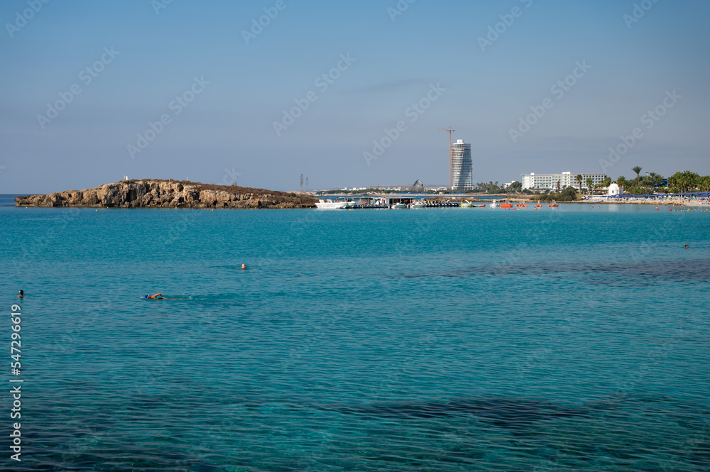 Aerial panoramic view on blue crystal clear water on Mediterranean sea on Nissi beach, Ayia Napa, Cyprus