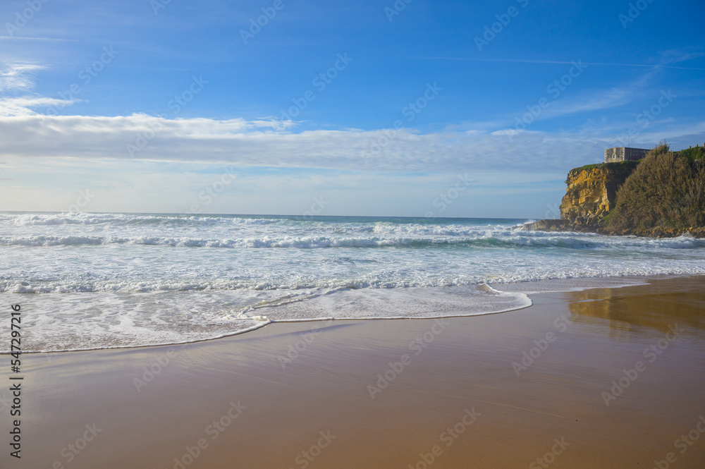 Magoito Beach at sunset, beautiful sandy beach on Sintra coast, Lisbon district, Portugal, part of Sintra-Cascais Natural Park with natural points of interest