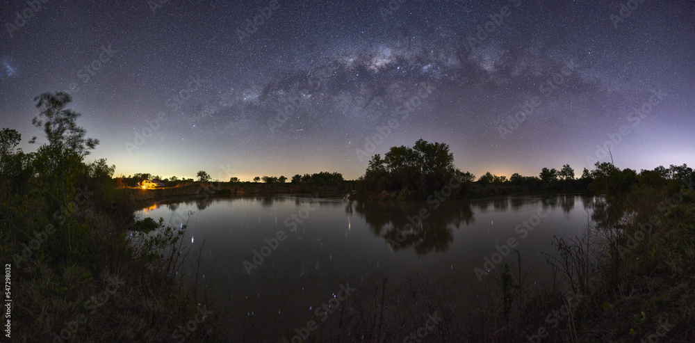 Fototapeta premium fishermen cooking on a night with the milky way in the Province of Entre Rios, Argentina
