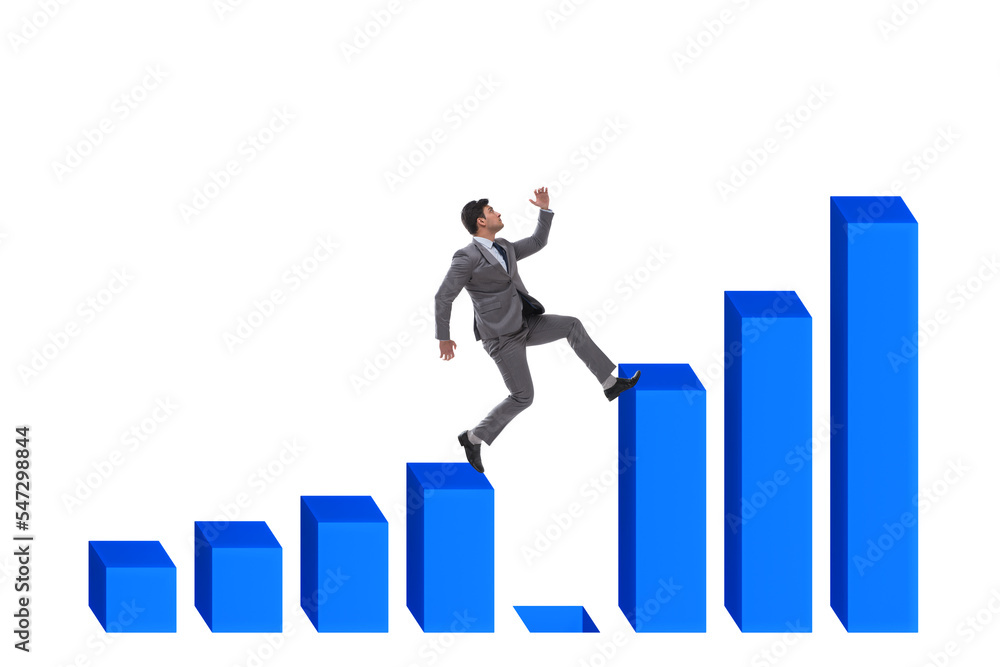 Businessman in growth concept with bar charts Businessman in growth concept with bar charts