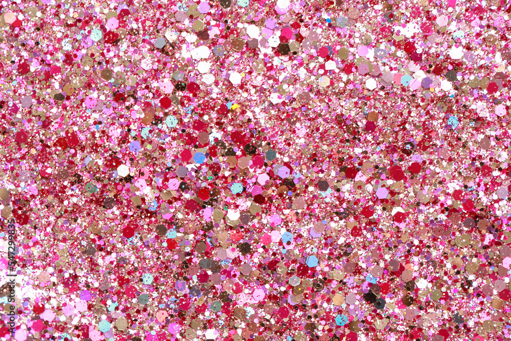 Beautiful pink shiny glitter as background, top view Beautiful pink shiny glitter as background, top view