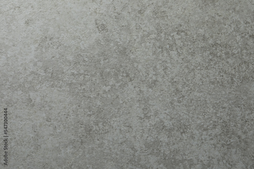 Texture of light grey stone surface as background, closeup Texture of light grey stone surface as background, closeup
