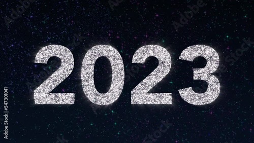 2023 tittle animation on a blue background with fireworks. Happy New Year 2023 Greetings Card Abstract Blinking Sparkle Glitter Particle. Merry Christmas. 