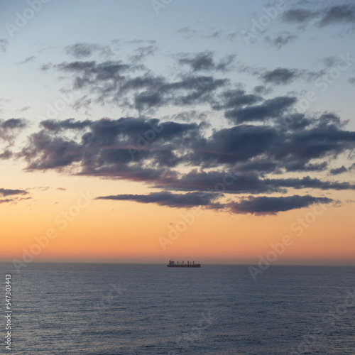 A lonely ship at sea during sunset  © Emanuil