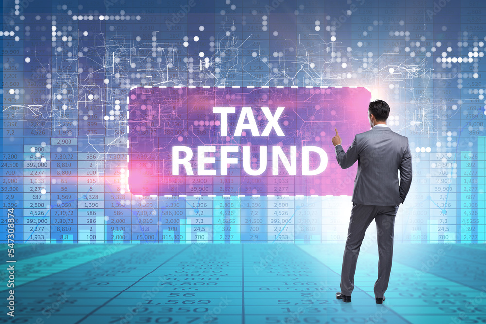 Businessman in tax refund concept Businessman in tax refund concept
