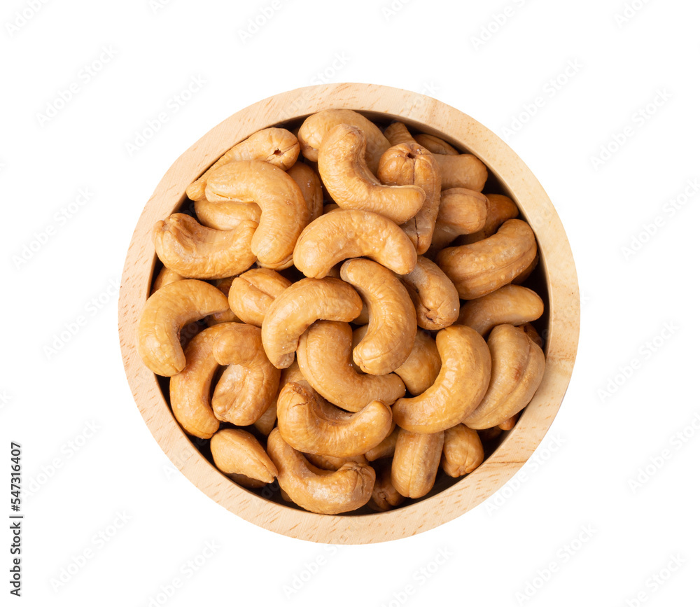 Roasted cashew nuts with salted in wood bowl isolated on transparent png Roasted cashew nuts with salted in wood bowl isolated on transparent png