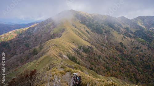 View of Mt. Tsurugi and climbers seen from a mountain called Jirogyu in Japan seen on the way to climb 