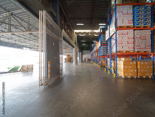 Interior of large warehouse retail store industry. Rack of furniture and home accessories stock storage. Interior of cargo in ecommerce and logistic concept. Depot