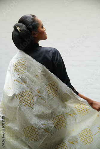 women with natural dyed Javanese batik