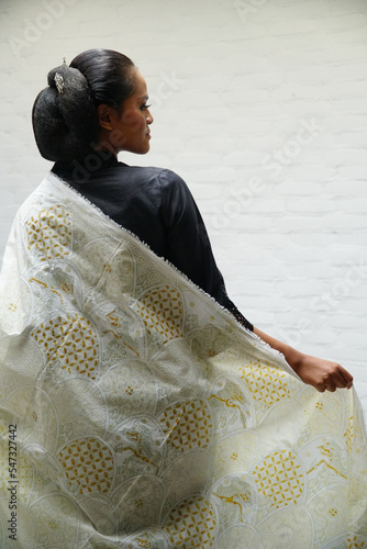 women with natural dyed Javanese batik