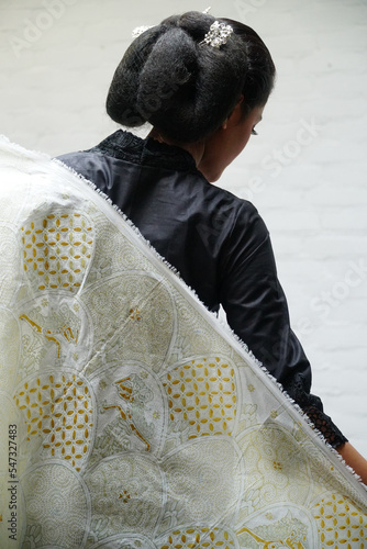 women with natural dyed Javanese batik