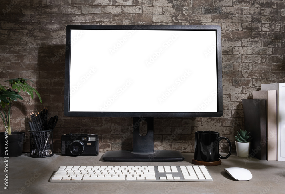 Fototapeta premium Creative, stylish workspace with blank screen desktop computer, books, camera and houseplant.
