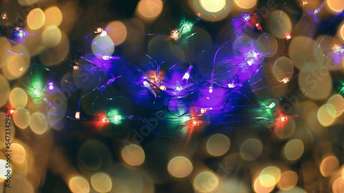 garland with colorful lights on black background