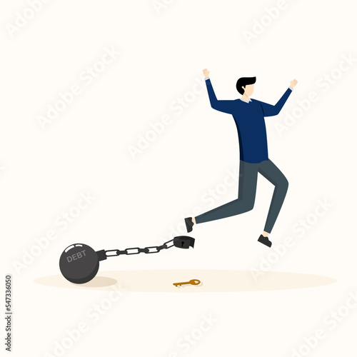 Businessman jumps for joy after unlocking debt load chain. loans or installments, debt free or freedom to pay off debts, solutions to overcome financial problems, savings or investments to free yourse