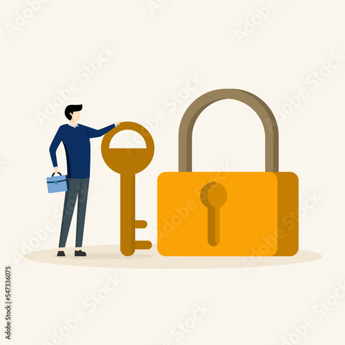 businessman holding key to unlock pad. professional to provide solutions, Key to unlock, solve business problems, key to successful business or unlock business accessibility concept.