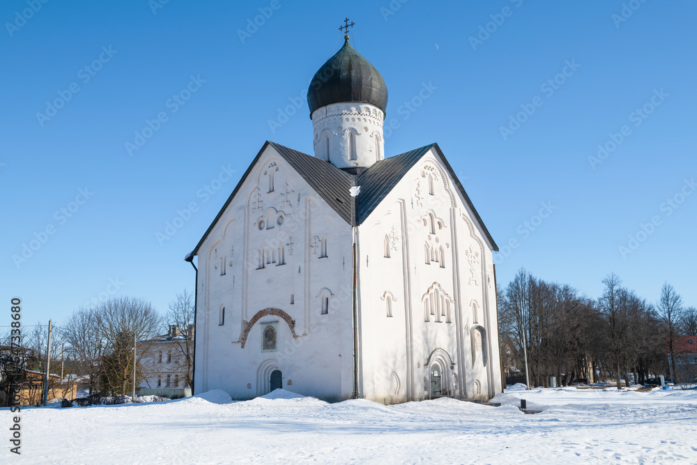 Medieval Church of the Transfiguration of the Savior (1374) close-up on a sunny March day. Veliky Novgorod, Russia