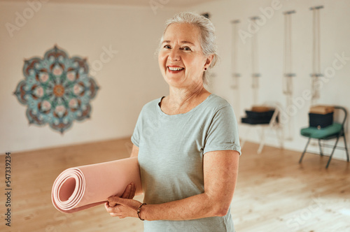Fotografia Senior woman, yoga and mat, portrait and fitness, wellness and healthy lifestyle in sports studio, gym and club