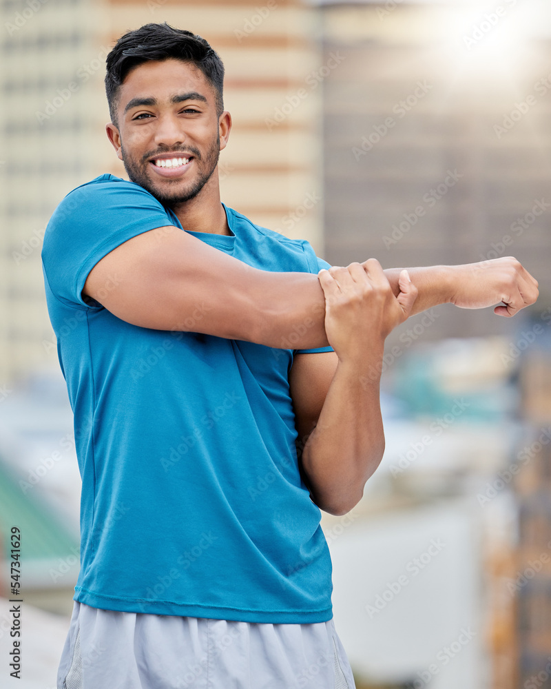 Fitness, exercise and stretching with a sports man doing a warm up before a workout or training routine. Portrait, health and stretch with a male athlete getting ready for a cardio run outdoor