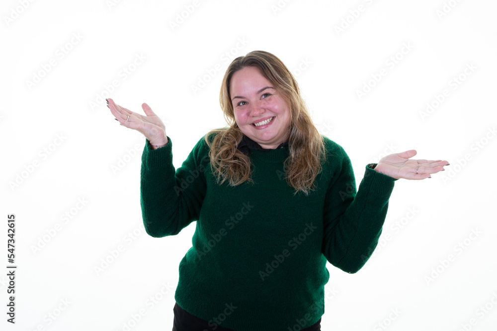 plus size pretty woman shrugging with dumb puzzled expression in feeling annoyed and clueless in white background plus size pretty woman shrugging with dumb puzzled expression in feeling annoyed and clueless in white background