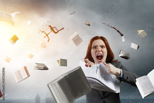 Εκτύπωση καμβά Young stressed woman ripping documents with frustrated facial expression