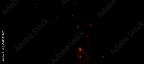 Sparks from the flame on a black background.