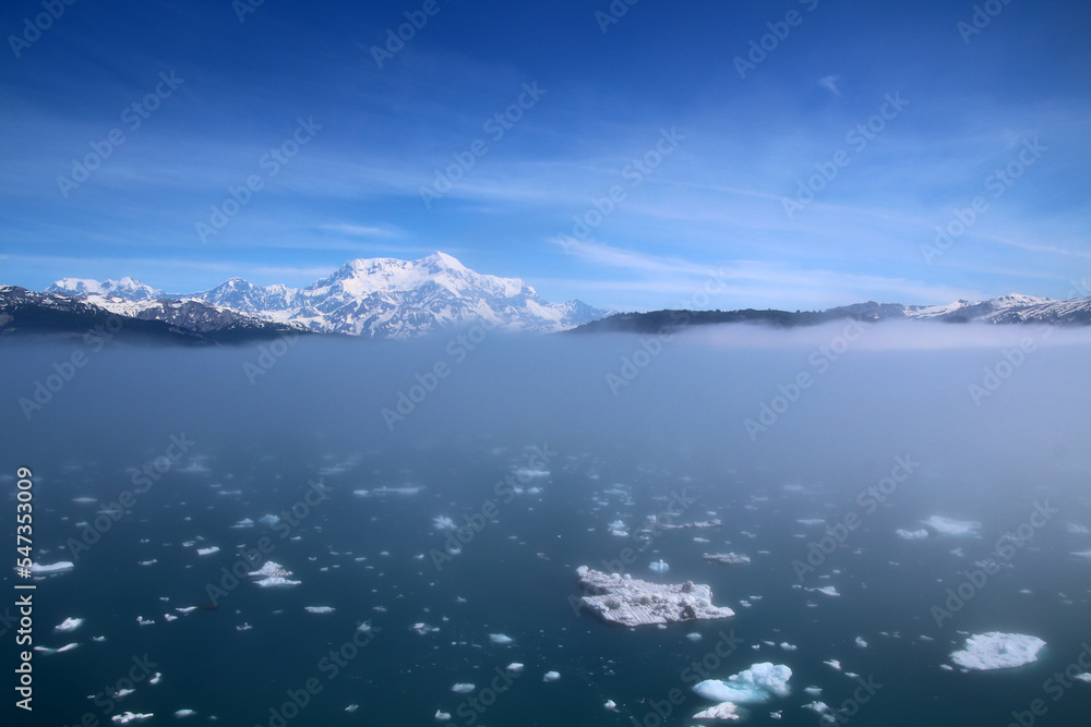 Mount Saint Elias in a fog bank in Icy Bay, Alaska, United States America  