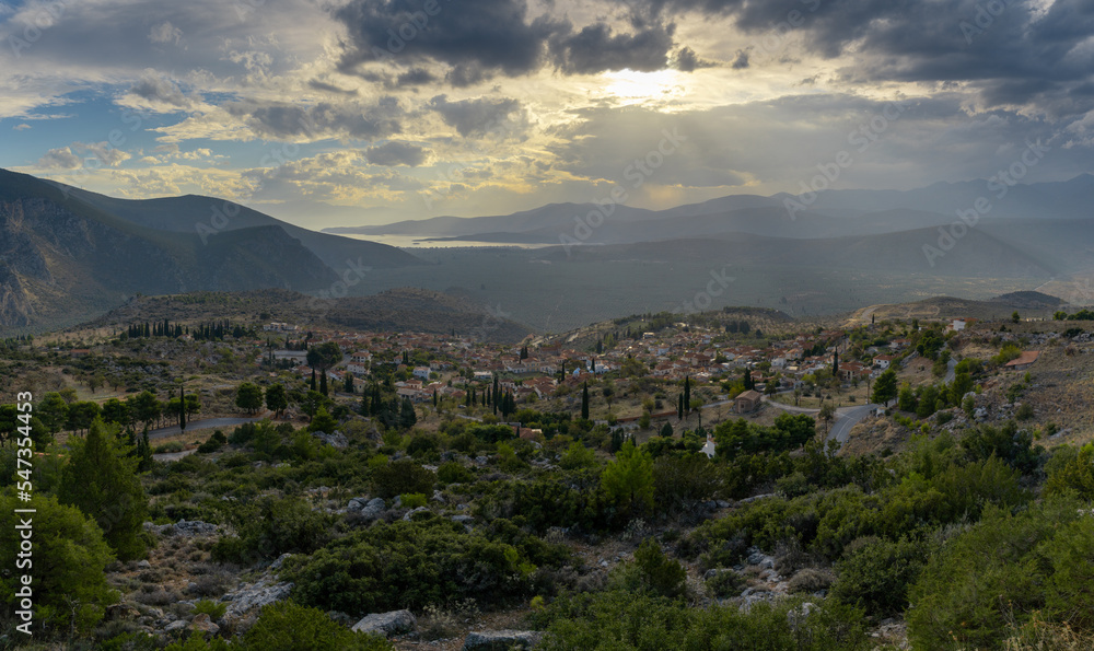 view of the village of Chrisso and the Crissaean Gulf in Central Greece after an evening thunderstorm