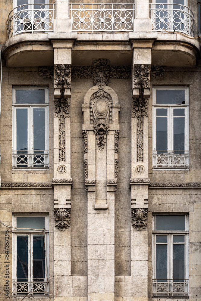 Architectural detail of neoclassical buildings in Istanbul. Facade parts. Windows of houses in art nouveau style.