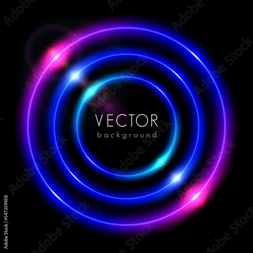 Abstract circle light neon glowing rings on black background