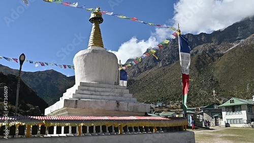 White stupa in Khumjung village the largest Sherpa village in Khumbu region of Nepal. photo