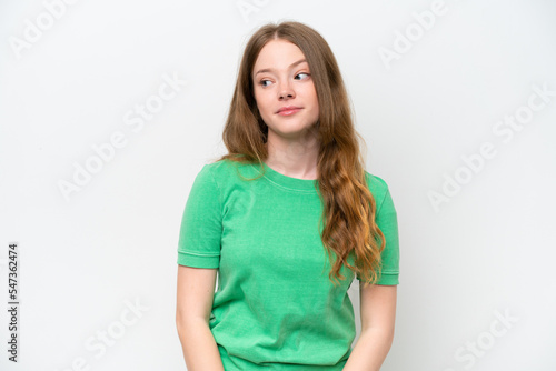Young pretty woman isolated on white background making doubts gesture looking side
