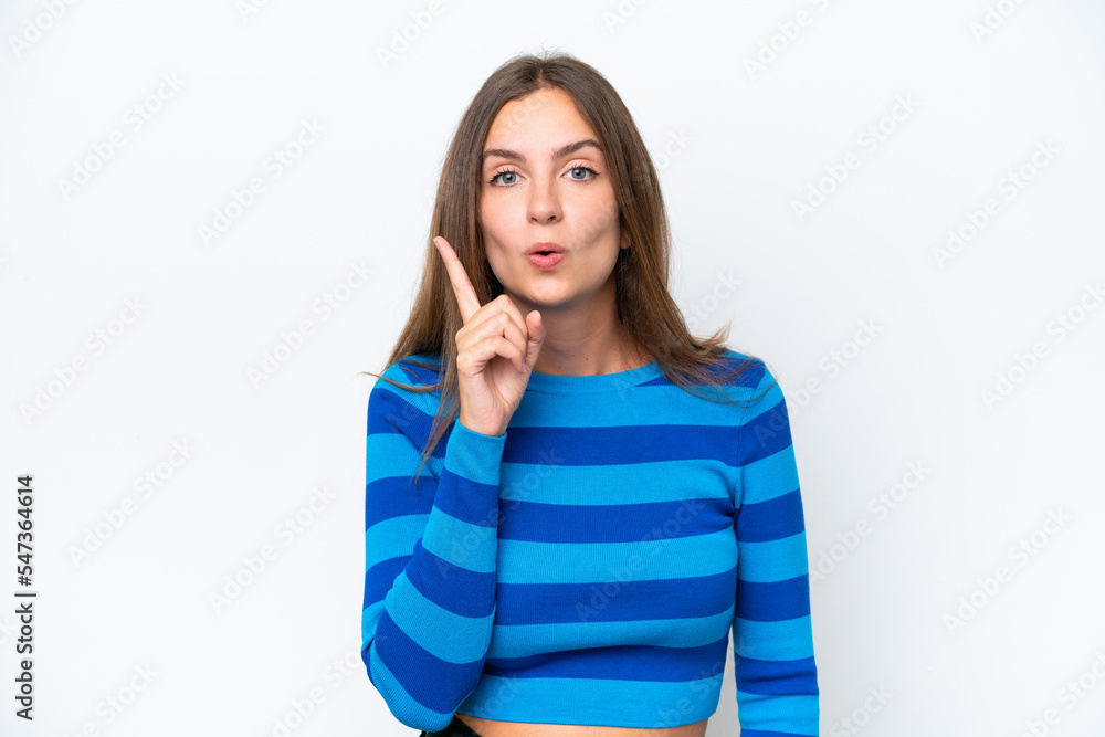 Young caucasian woman isolated on white background intending to realizes the solution while lifting a finger up Young caucasian woman isolated on white background intending to realizes the solution while lifting a finger up