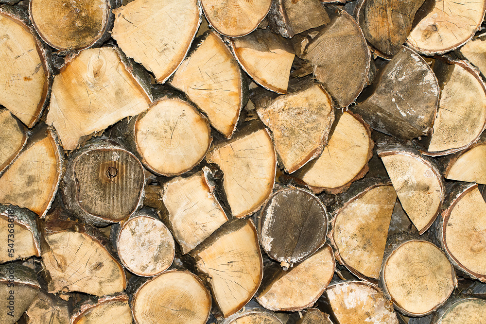 Firewood stacked for storage seamless pattern, dry chopped firewood seamless texture or background Firewood stacked for storage seamless pattern, dry chopped firewood seamless texture or background