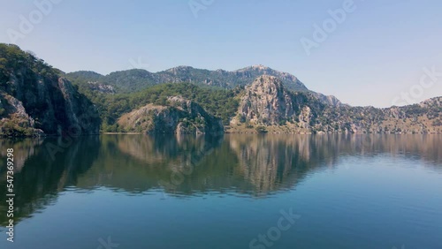 Beautiful seashore. Islands in the distance. Colorful blue sea. The beauty of Turkey. Beautiful rocks and mountains. Sunny clear day. Beautiful water.	