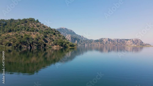Beautiful seashore. Islands in the distance. Colorful blue sea. The beauty of Turkey. Beautiful rocks and mountains. Sunny clear day. Beautiful water.	