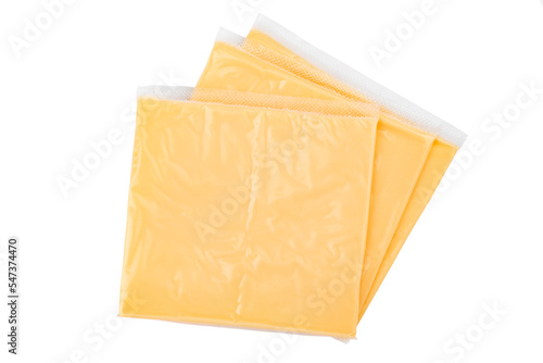 Processed cheese for making hamburgers and cheeseburgers wrapped in clear transparency plastic package isolated on white background.