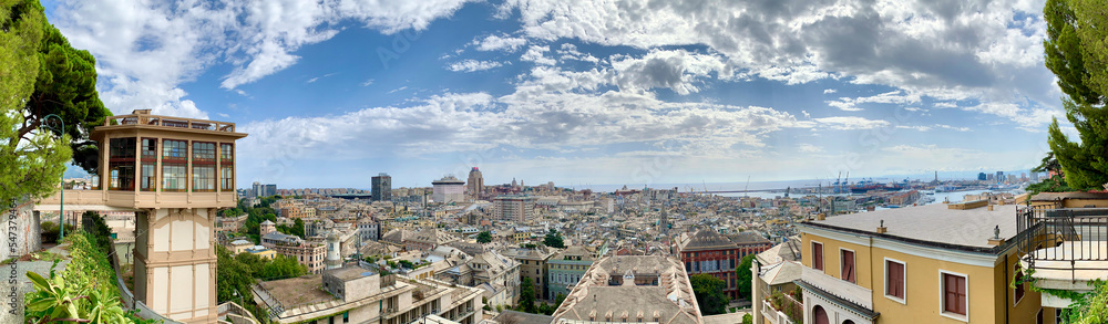 Genoa city panorama with Castelletto Art Nouveau lift with wide-angle view of old city and port