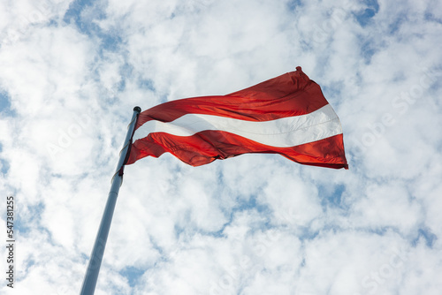 Konstfotografi Latvian flag waving in Riga, Latvia