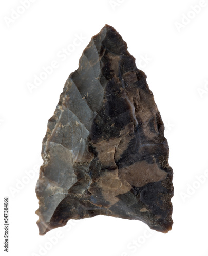 Flint arrowhead on white background photo