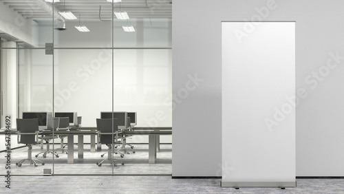 Blank roll up banner stand mock up in modern office.