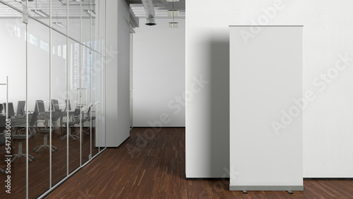 Blank roll up banner stand mock up in modern office.