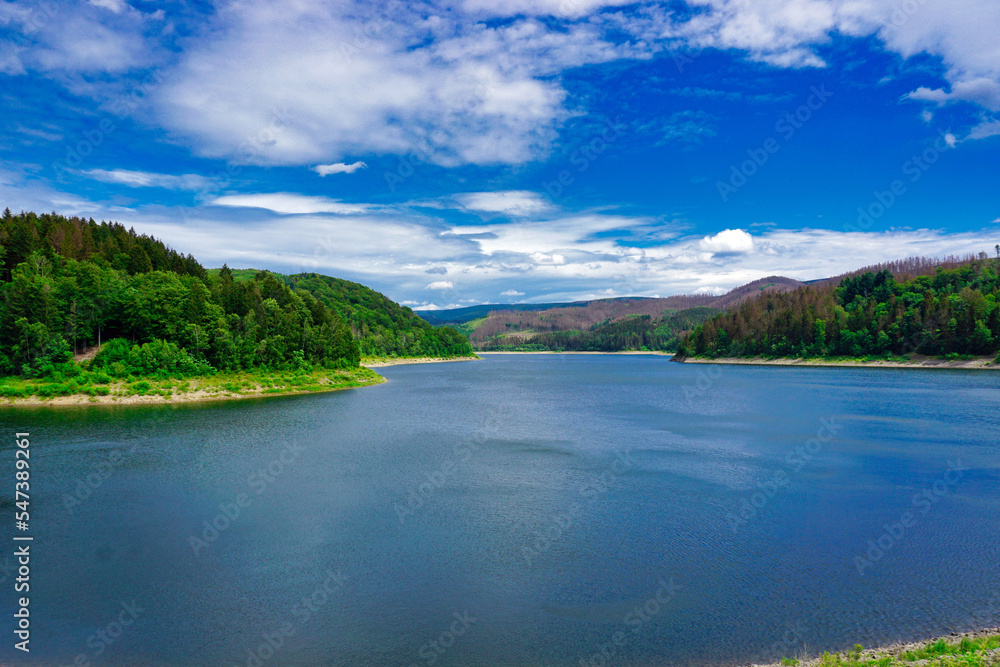 landscape with lake and blue sky landscape with lake and blue sky