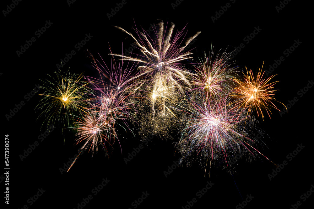 Colored fireworks on black background copy space