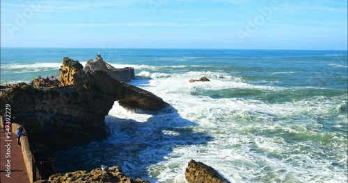 Swell breaking on the famous rock of the Virgin in the city of Biarritz  photo