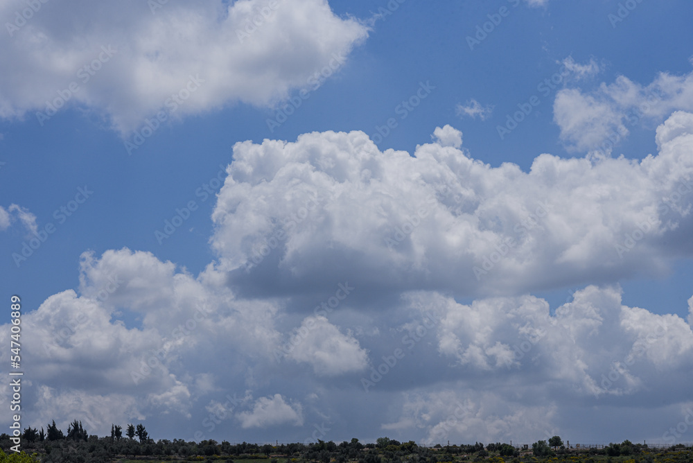 Clear blue sky with white clouds over the city. Panorama.Background. Clear blue sky with white clouds over the city. Panorama.Background.