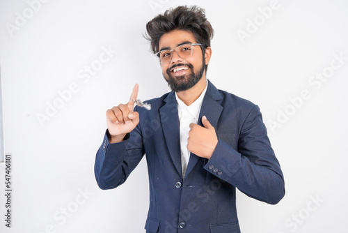 young indian businessman real estate agent