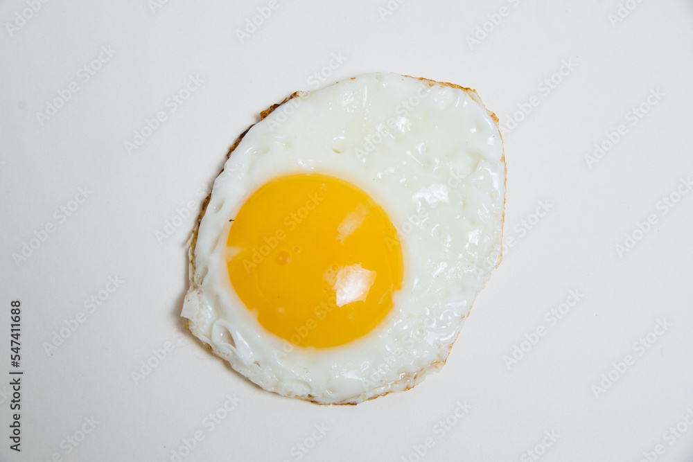 Fried egg isolate on a white background flatlay Fried egg isolate on a white background flatlay