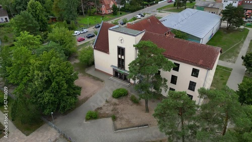 Wallpaper Mural Large school building with schoolyard in germany. Tranquil aerial view flight Torontodigital.ca