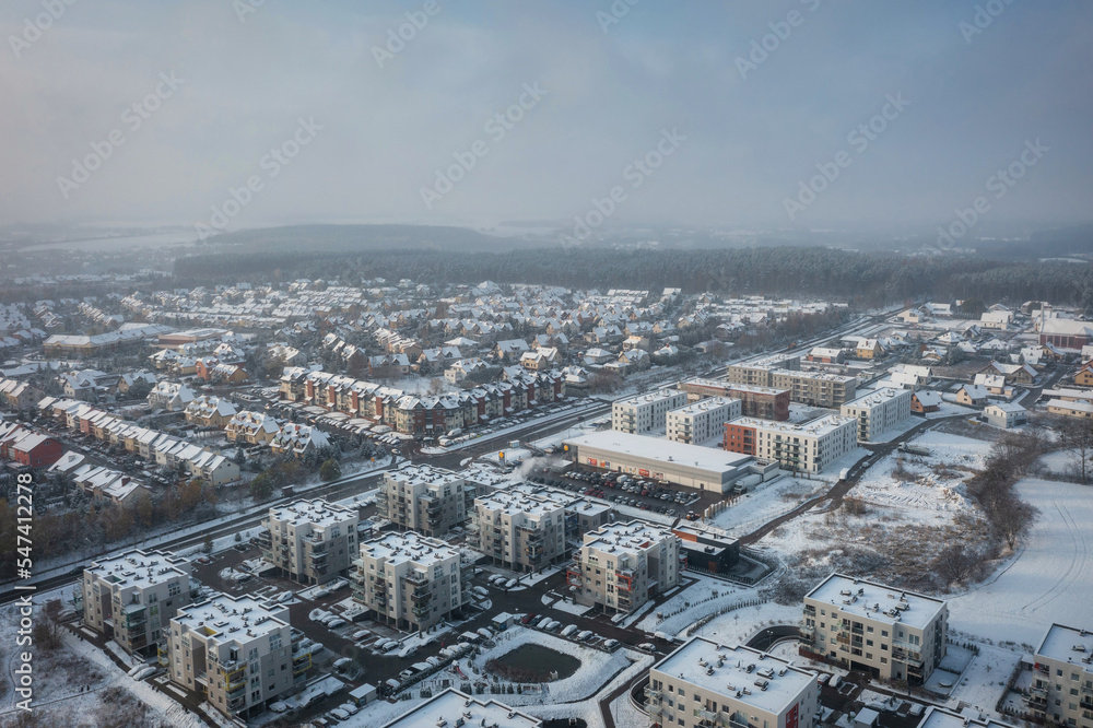 Aerial landscape of small village covered with fresh snow. Poland